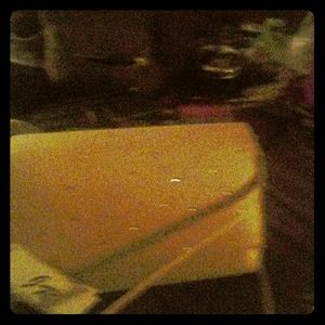 Cluth purse tan never been used